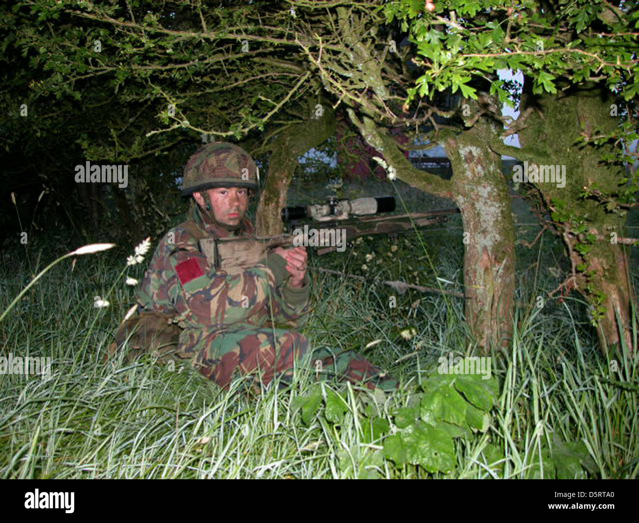 British Sniper with AI L115A3 sniper rifle, Stock Photo