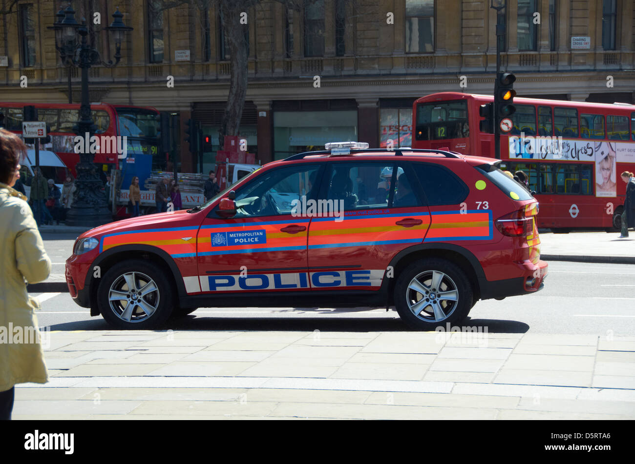 Red Diplomatic Protection unit Police car in London near Trafalgar Square. Stock Photo