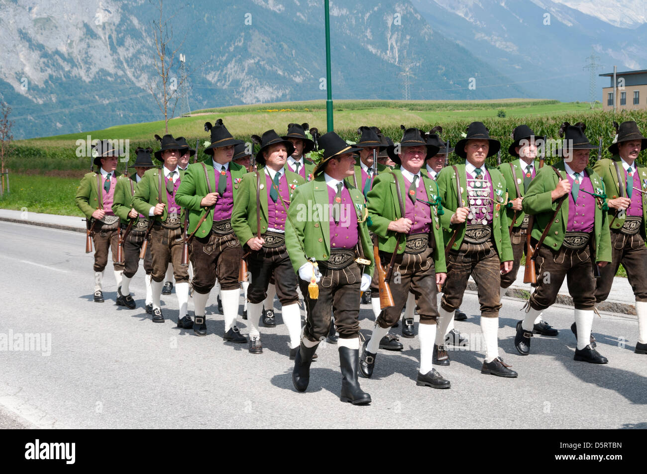 people making music in procession to the church on Maria Ascension,on August 15, 2012 in Axams, Austria. Stock Photo