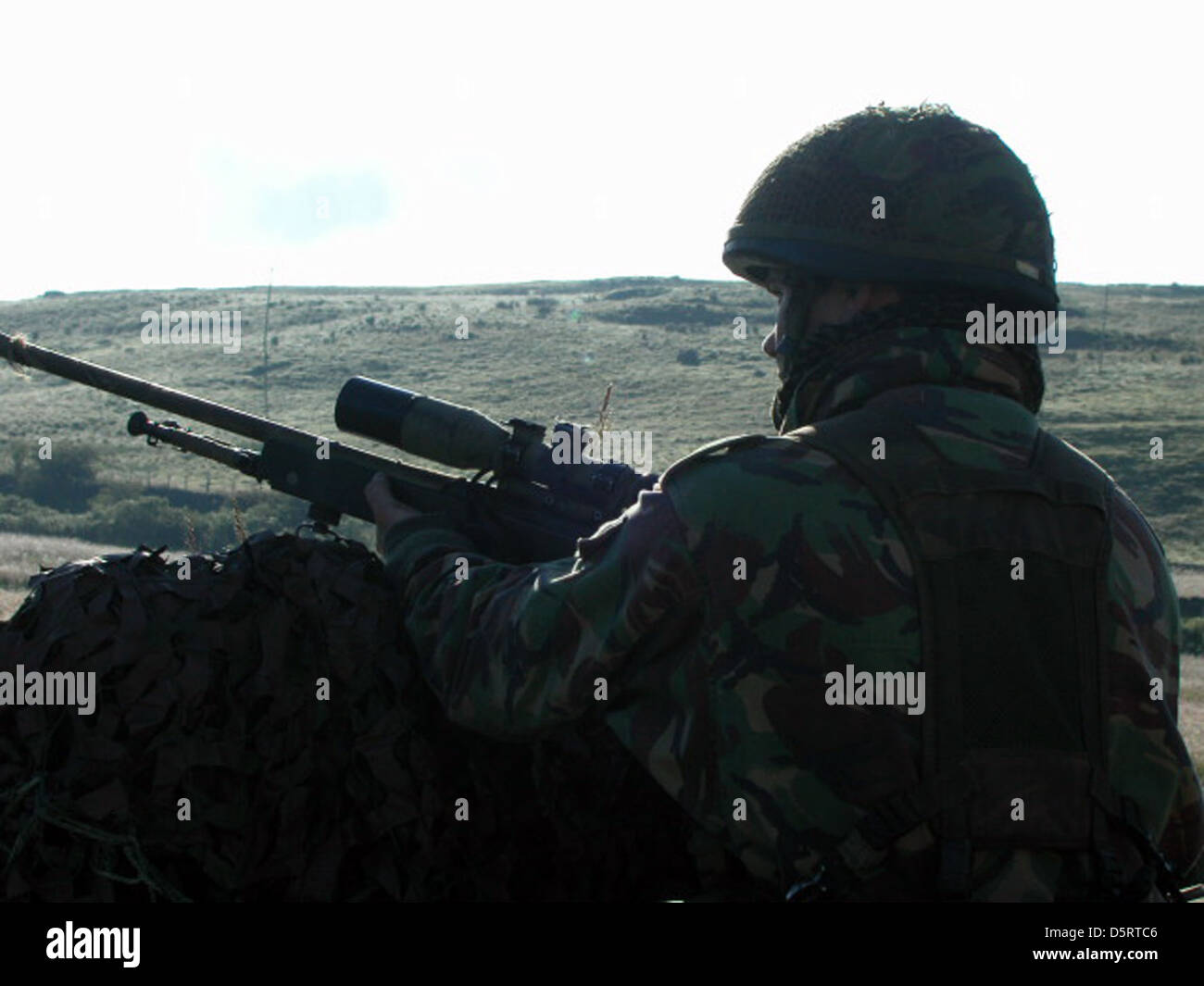 British Sniper with AI L115A3 sniper rifle, Stock Photo