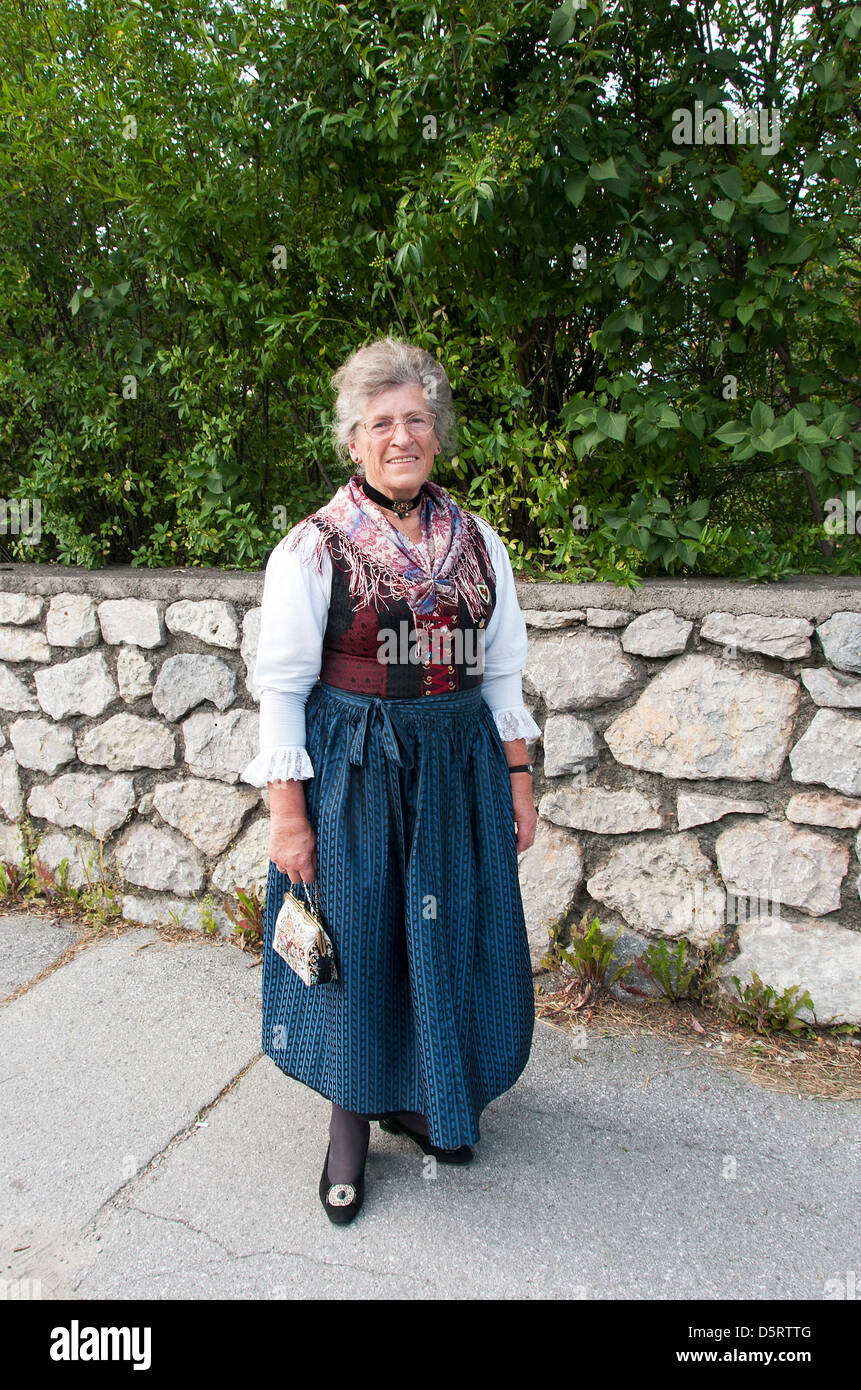 woman showing traditonal dress,on August 15, 2012 in Axams, Austria Stock Photo