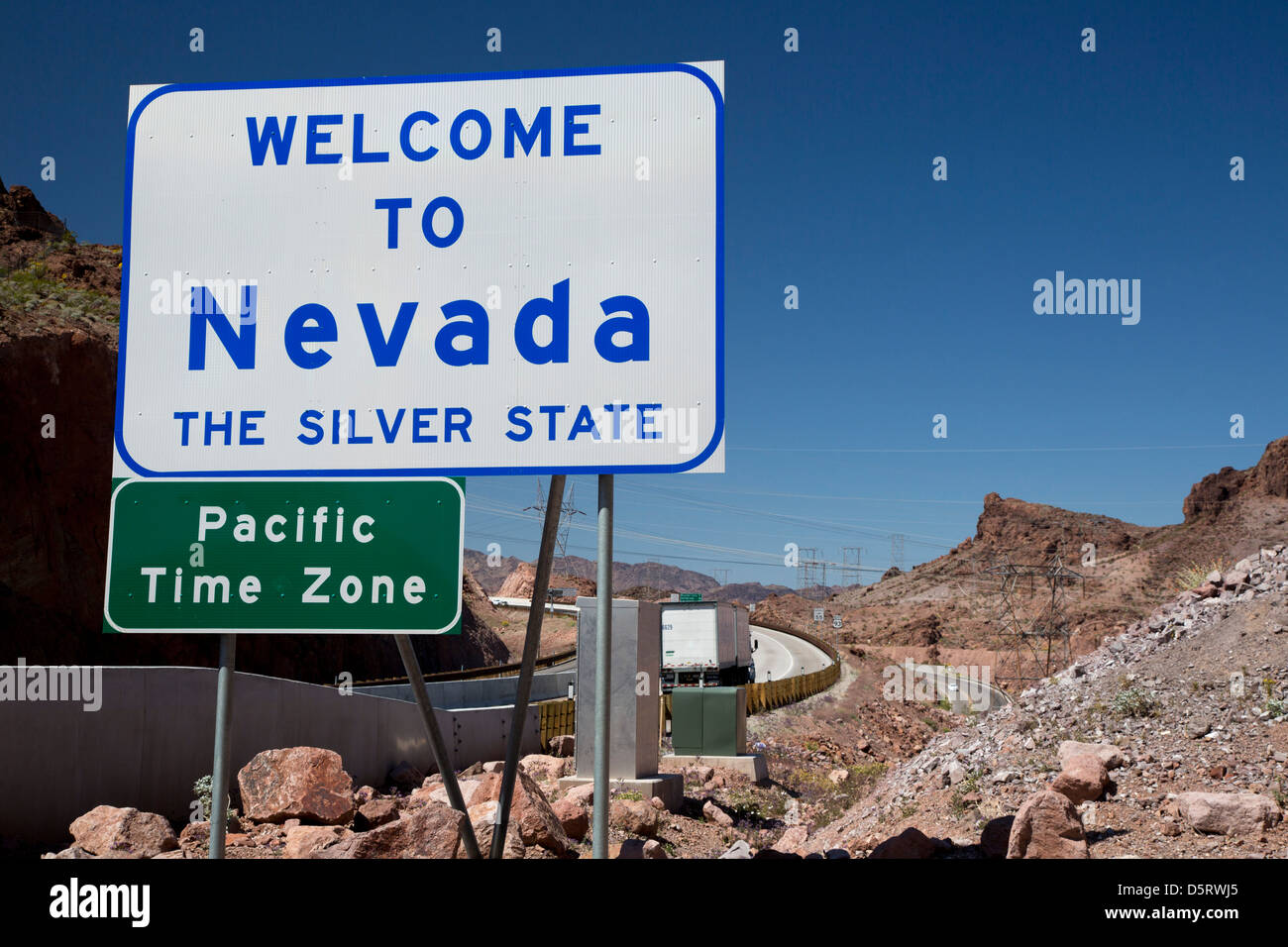 Boulder City, Nevada - A sign welcomes drivers on US 93 to Nevada as they cross a bridge from Arizona over the Colorado River. Stock Photo