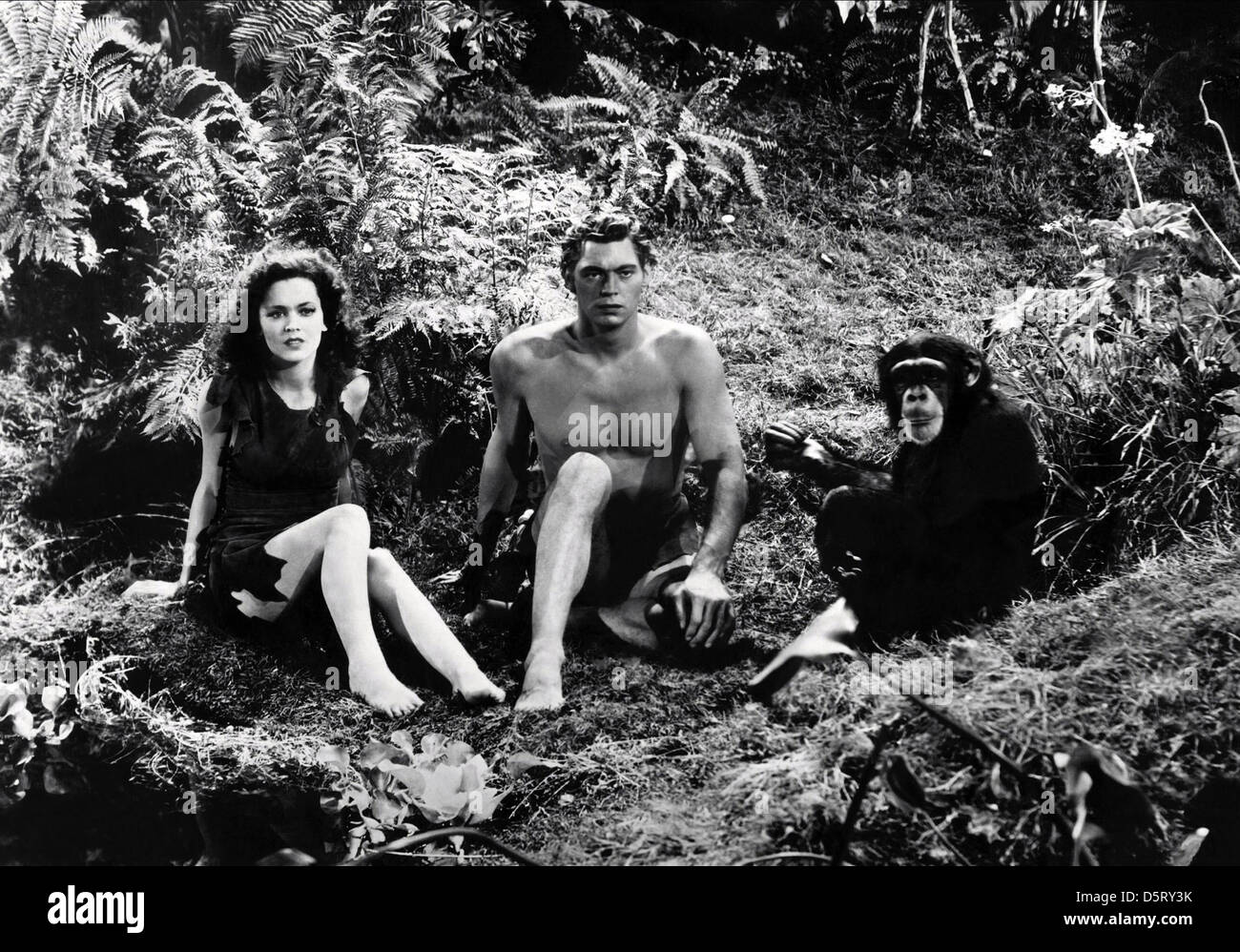 MAUREEN O'SULLIVAN, JOHNNY WEISSMULLER, TARZAN ESCAPES, 1936 Stock Photo