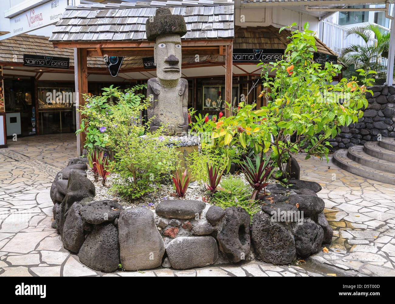 A Stone Statue Located In The Inner Courtyard Of The Vaima Shopping