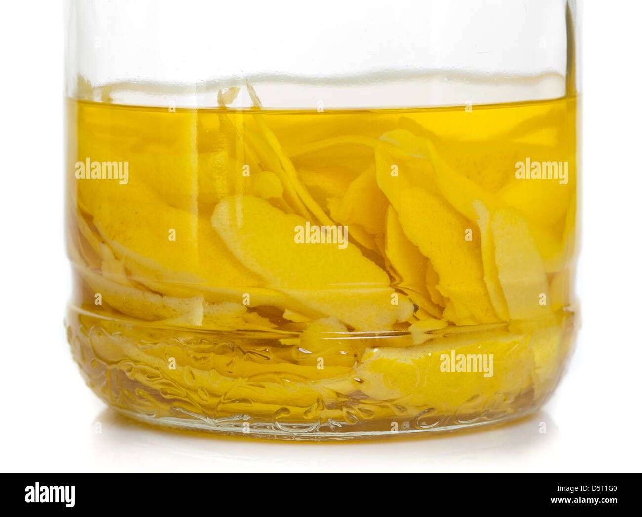 Italian alcoholic beverage - lemon peel in fermentation for limoncello Stock Photo
