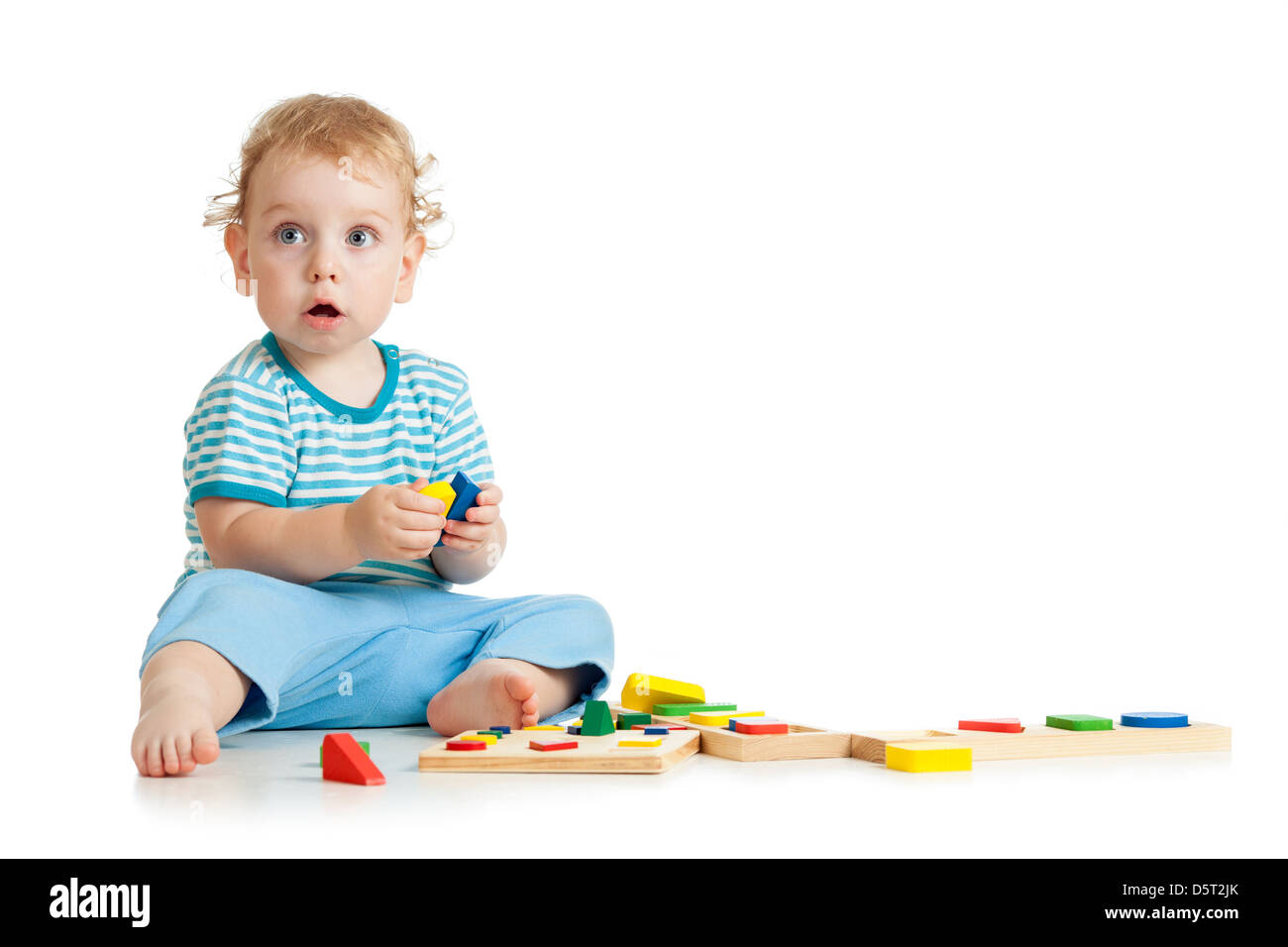 happy kid playing toys Stock Photo