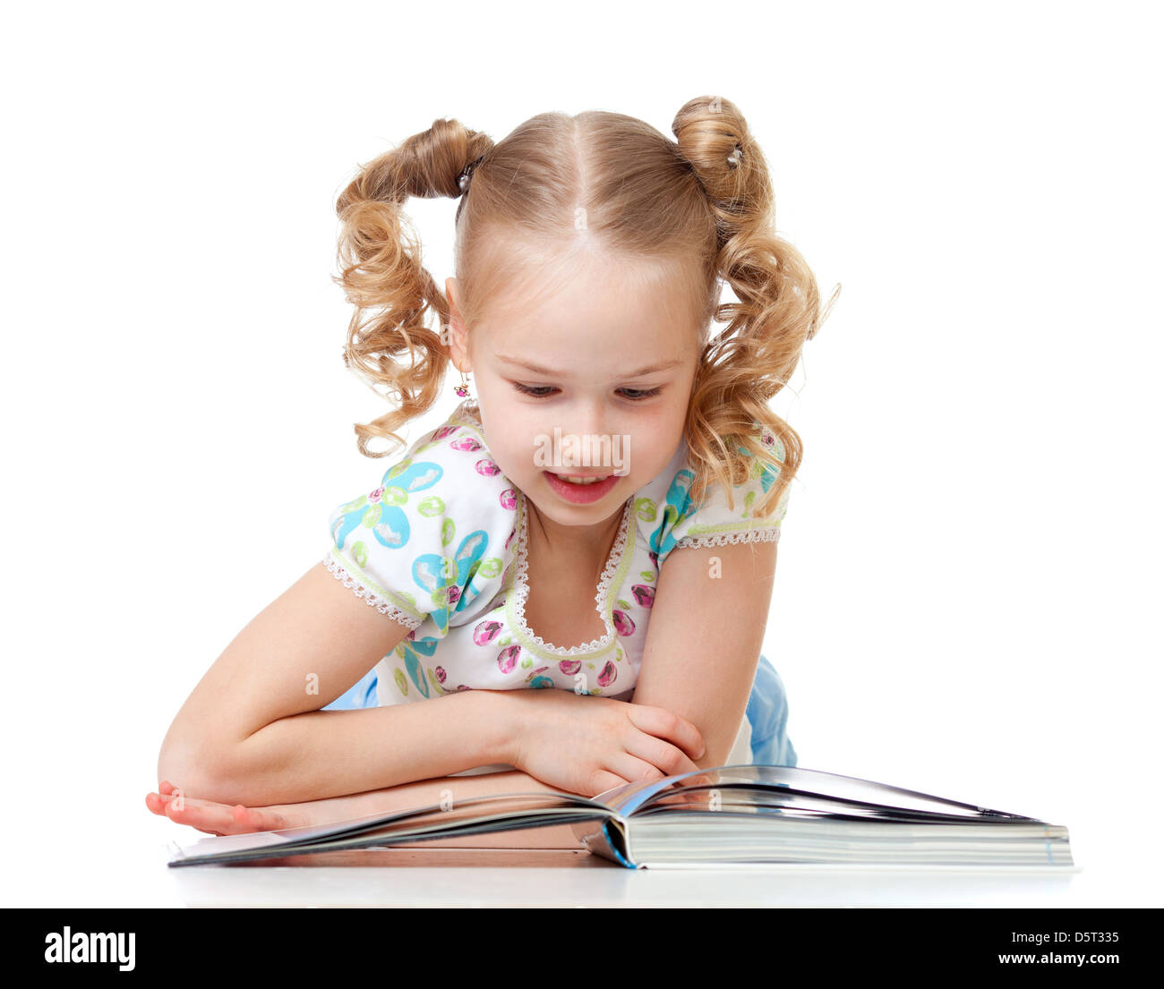 cute happy kid reading a book Stock Photo Alamy