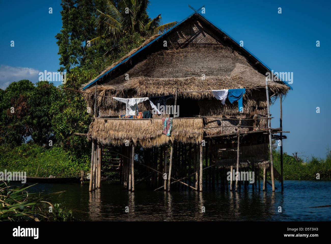 House on stilts during the wet season on Inle Lake in Myanmar. Stock Photo