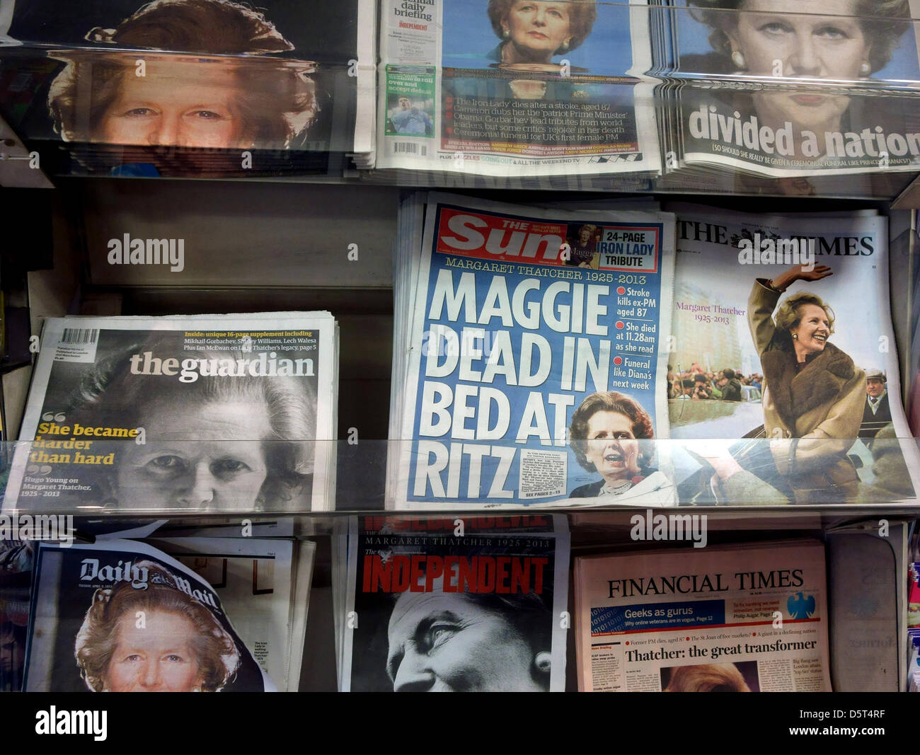 UK national newspapers with front pages devoted to the death of former PM Margaret Thatcher on sale in a London supermarket. Stock Photo