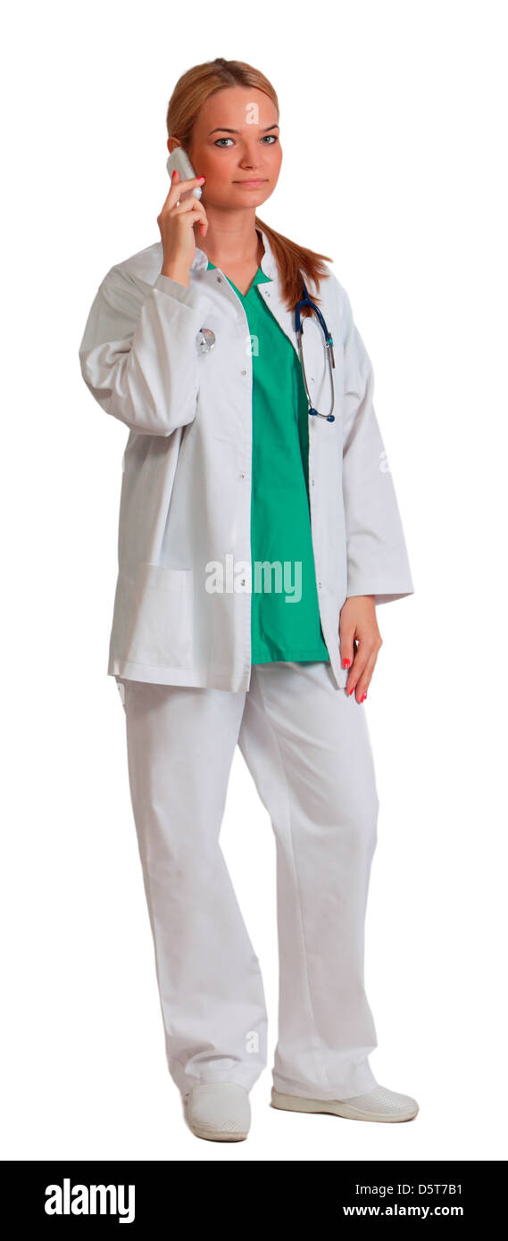 Young blonde woman doctor on the phone isolated against a white ...