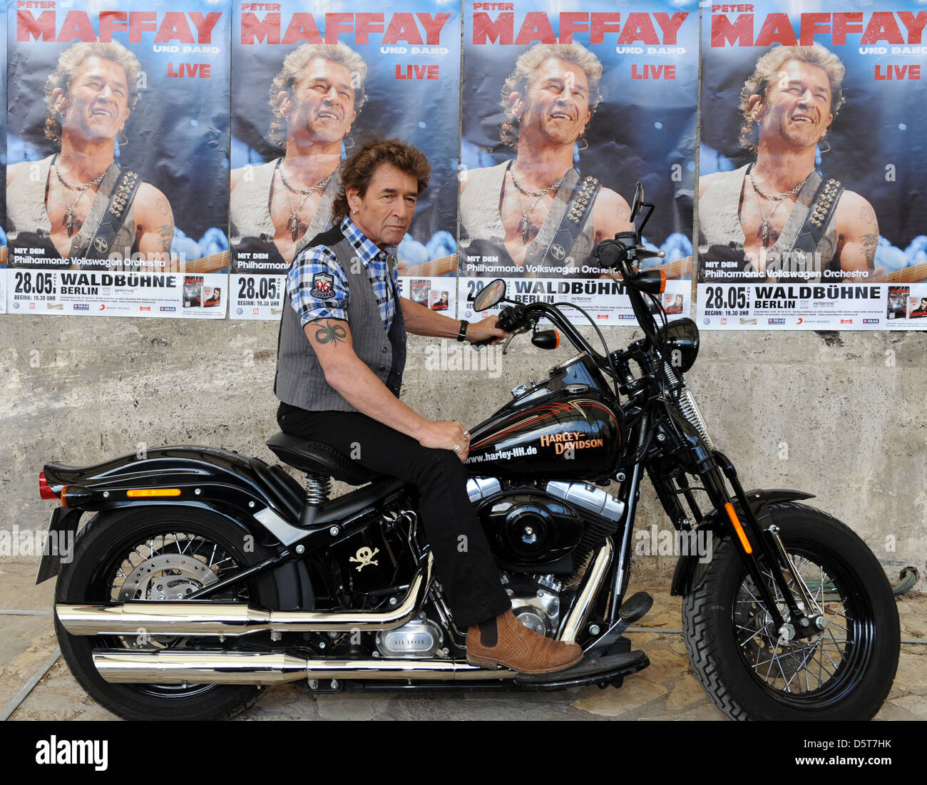 Peter Maffay promotes his upcoming tour at Waldbuehne arena at a photocall  with a Harley Davidson bike. Berlin Germany Stock Photo - Alamy