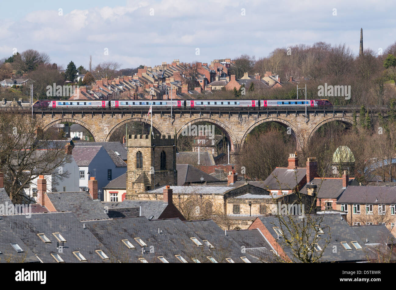 Cross country express passenger train crossing Durham railway viaduct north east England UK Stock Photo