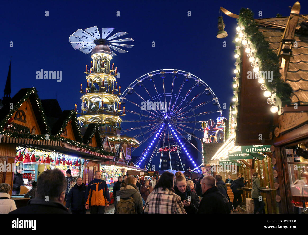 Visitors walk along the Christmas market in Rostock, Germany, 22