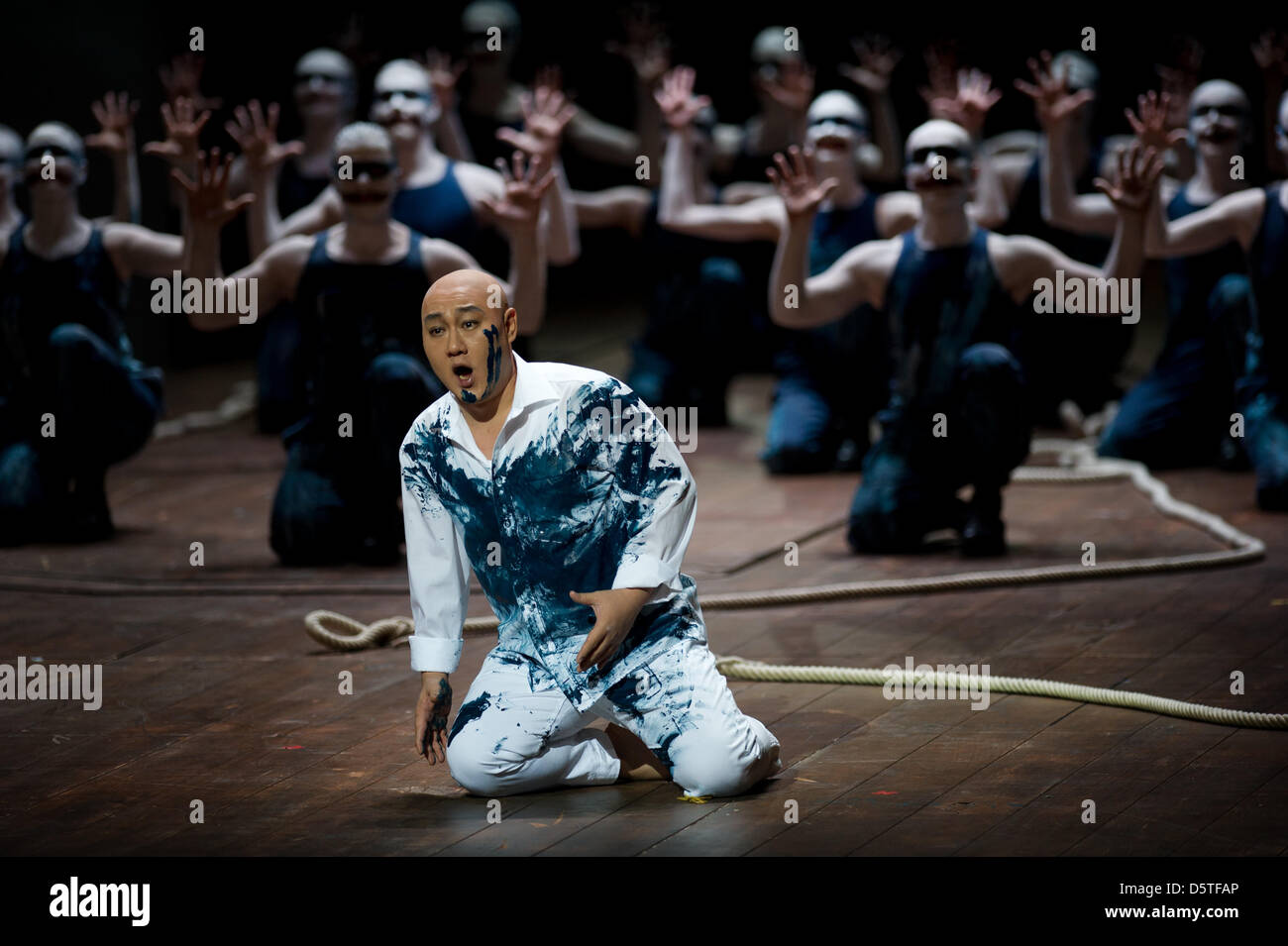 Wookyung Kim (FRONT) as Idomeneo and other members of the ensemble take ...