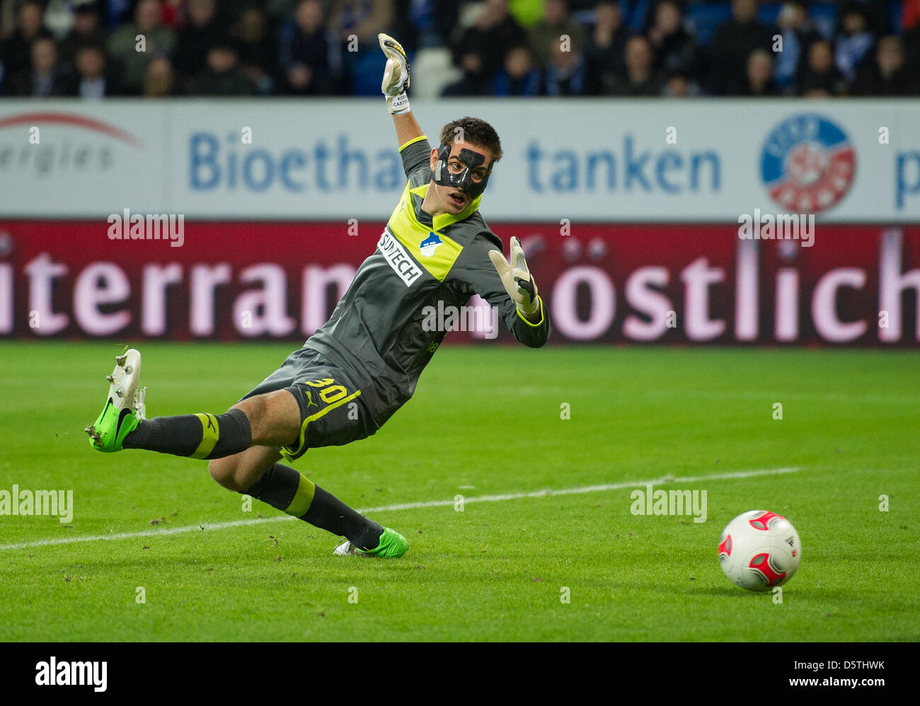 Hoffenheim's goalkeeper Koen Casteels cannot stop the ball during the German Bundesliga soccer match 1899 Hoffenheim vs Bayer 04 Leverkusen at Rhein Neckar Arena in Sinsheim, Germany, 25 November 2012. Photo: Uwe Anspach  (ATTENTION: EMBARGO CONDITIONS! The DFL permits the further utilisation of up to 15 pictures only (no sequntial pictures or video-similar series of pictures allow Stock Photo