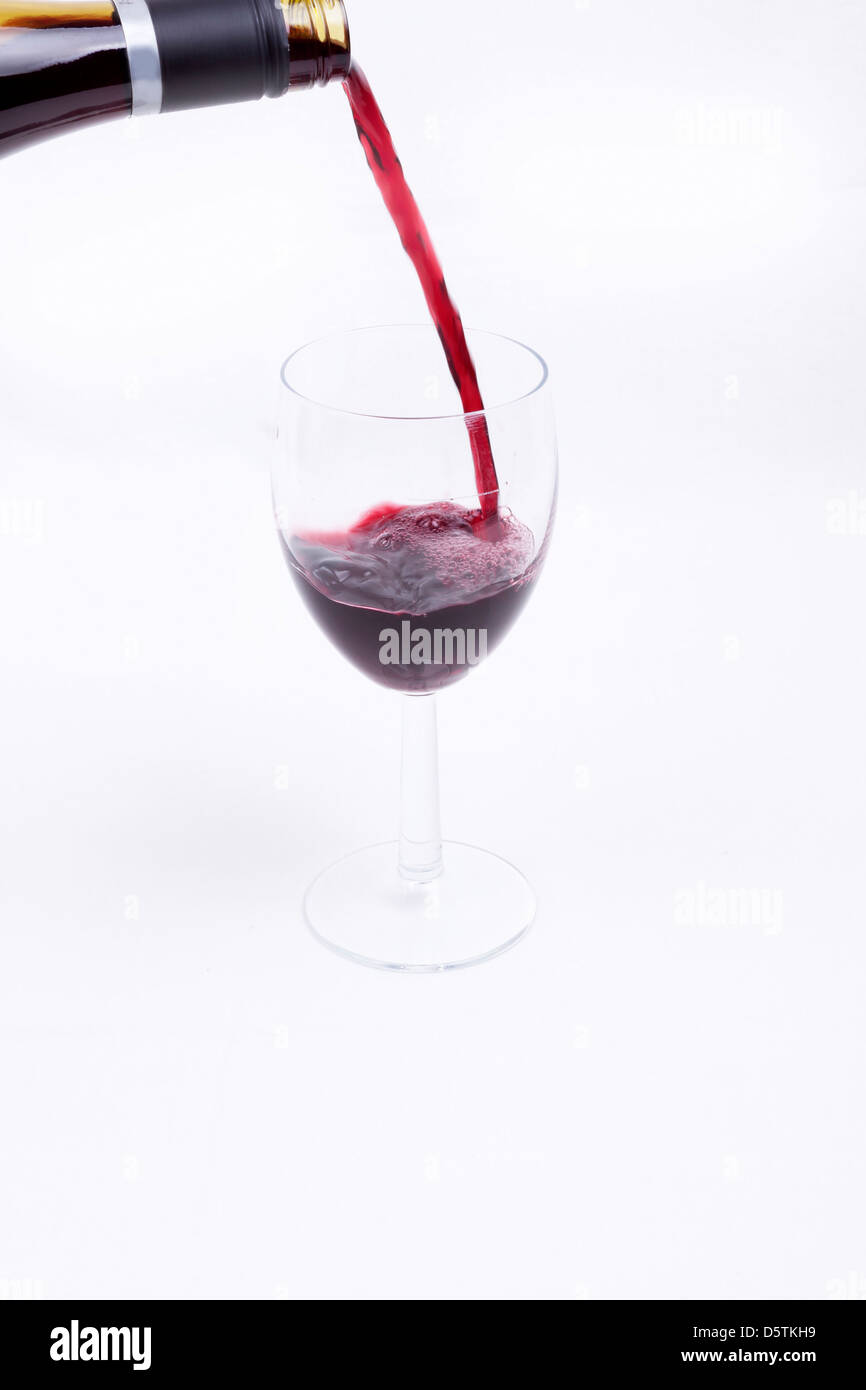 A glass of red wine isolated on white background Stock Photo - Alamy