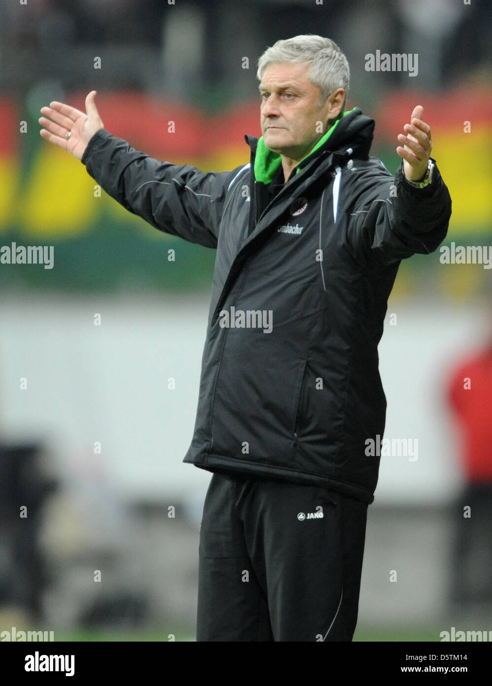 Frankfurt's head coach Armin Veh gestures from the sidelines during the German Bundesliga match between Eintracht Frankfurt and 1st FSV Mainz 05 at Commerzbank Arena in Frankfurt Main, Germany, 27 November 2012. Photo: ARNE DEDERT (ATTENTION: EMBARGO CONDITIONS! The DFL permits the further utilisation of up to 15 pictures only (no sequntial pictures or video-similar series of pictu Stock Photo