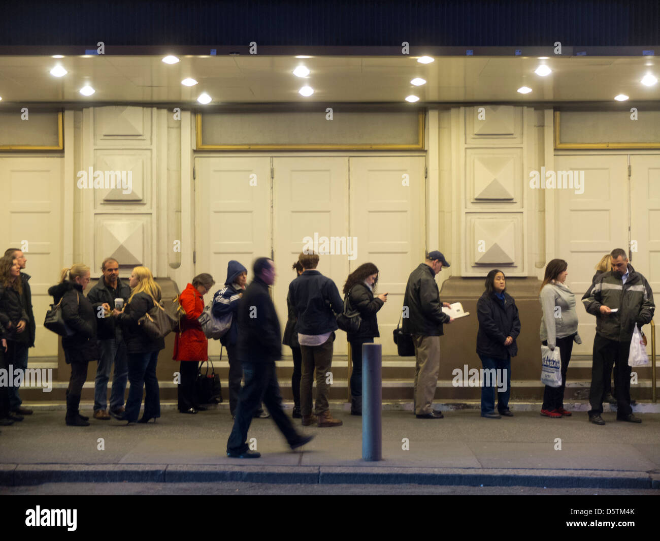 waiting in line for theater tickets Stock Photo