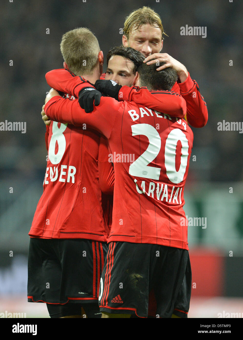 Leverkusen's Lars Bender (L), Simon Rolfes and Daniel Carvajal celebrate the 1-0 goal with goal scorer Gonzalo Castro during the German Bundesliga soccer match between Werder Bremen and Bayer Leverkusen at Weser Stadium in Bremen, Germany, 28 November 2012. Photo: CARMEN JASPERSEN  (ATTENTION: EMBARGO CONDITIONS! The DFL permits the further utilisation of up to 15 pictures only (no Stock Photo