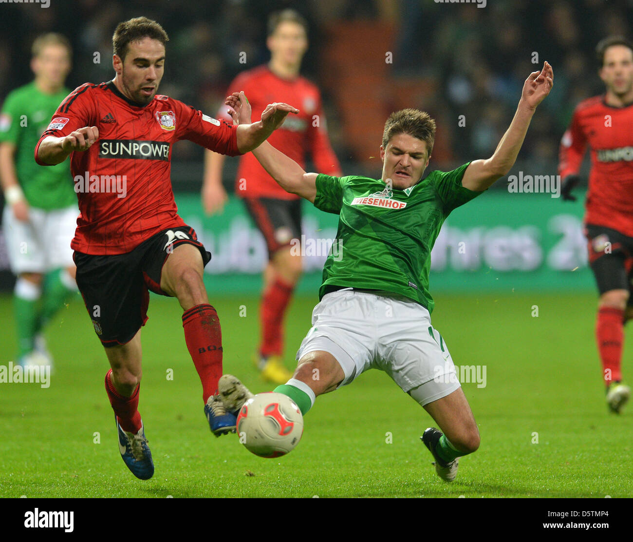 Werder's Aleksandar Ignjowski (L) vies for the ball with Leverkusen's Daniel Carvajal during the German Bundesliga soccer match between Werder Bremen and Bayer Leverkusen at Weser Stadium in Bremen, Germany, 28 November 2012. Photo: CARMEN JASPERSEN  (ATTENTION: EMBARGO CONDITIONS! The DFL permits the further utilisation of up to 15 pictures only (no sequntial pictures or video-sim Stock Photo
