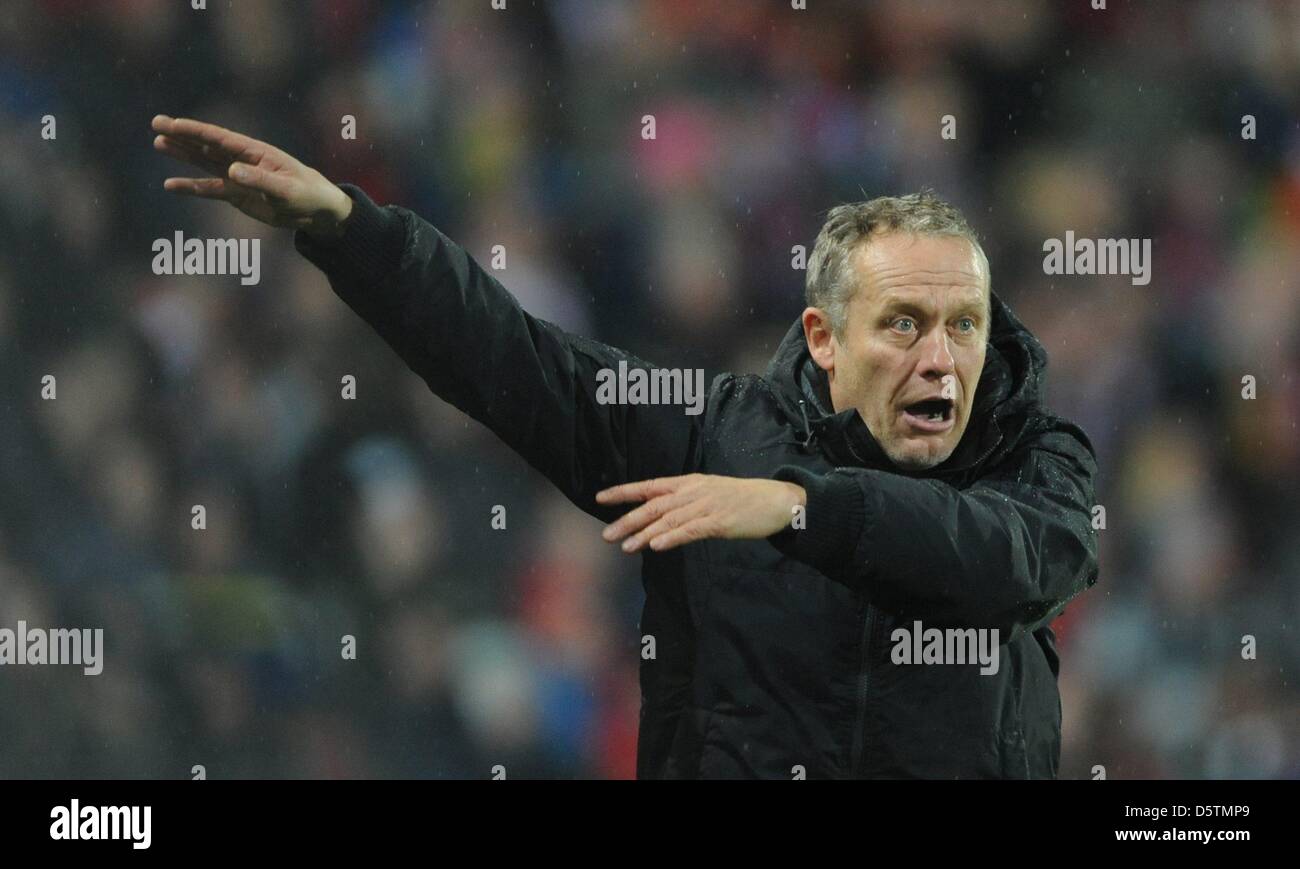 Freiburg's head coach Christian Streich gestures during the Bundesliga soccer match between SC Freiburg and Bayern Munich at Mage Solar Stadium in Freiburg, Germany, 28 November 2012. Photo: PATRICK SEEGER  (ATTENTION: EMBARGO CONDITIONS! The DFL permits the further utilisation of up to 15 pictures only (no sequntial pictures or video-similar series of pictures allowed) via the int Stock Photo