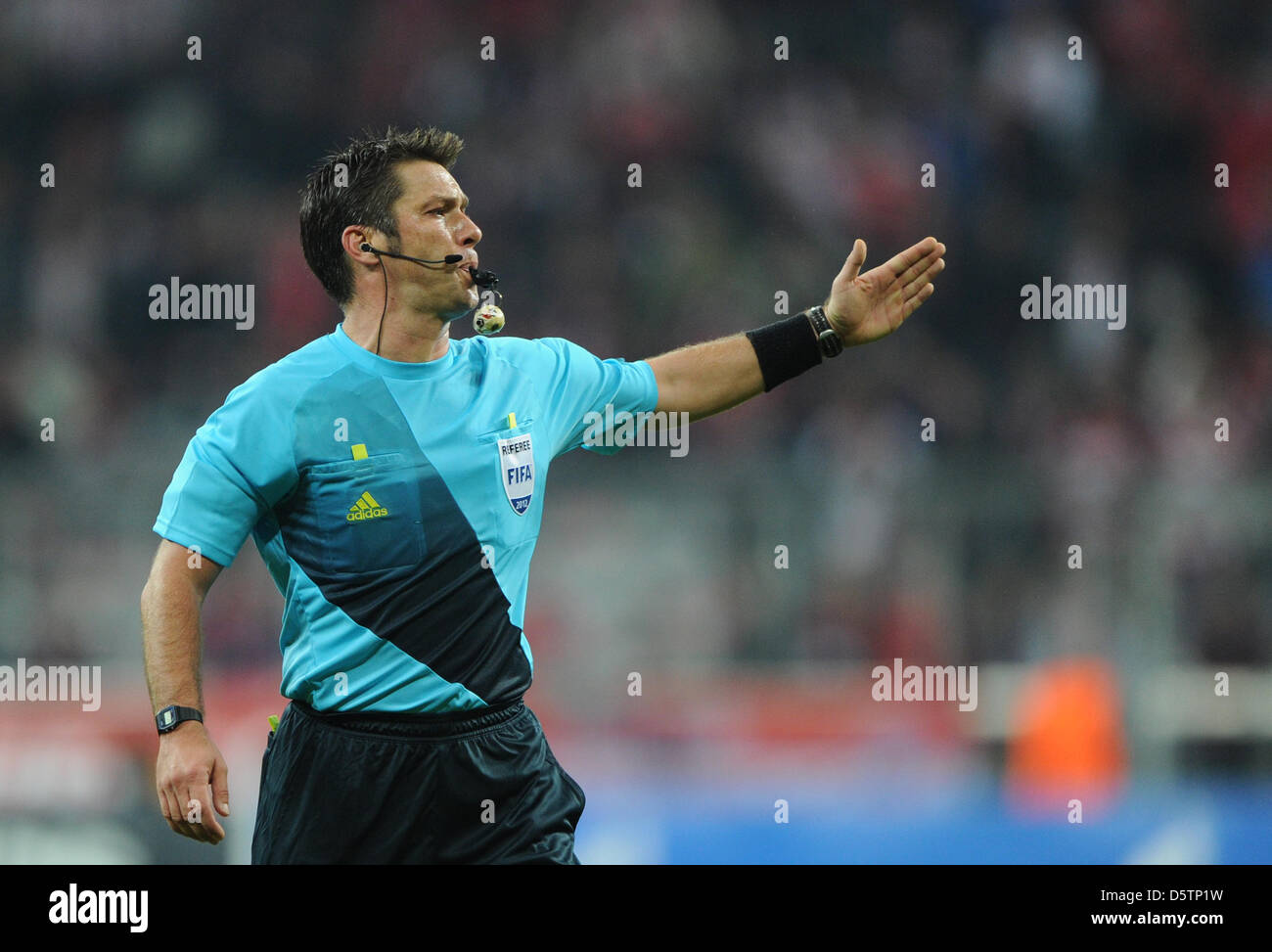 Referee Firat Aydinus (Turkey) gestures during the UEFA Champions League  group F soccer match between Bayern Munich and Valencia CF at Fußball Arena  München in Munich, Germany, 19 September 2012. Ohoto: Andreas