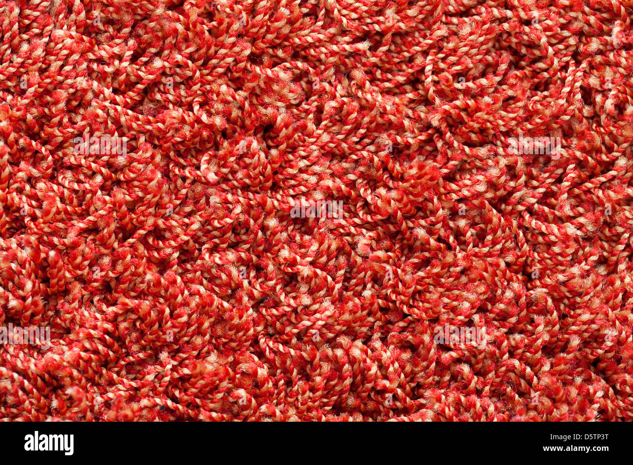 Red soft carpet closeup background texture Stock Photo