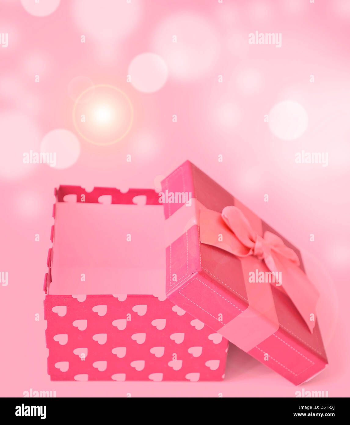 Wrapped opened gift box hi-res stock photography and images - Alamy