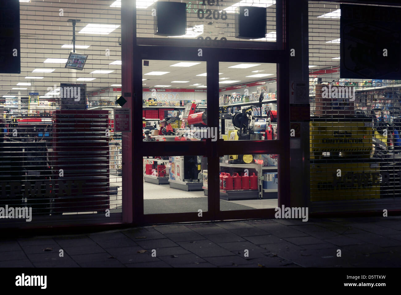 retail hardware store shop high street at night Stock Photo - Alamy