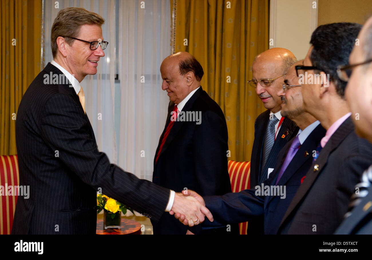 German Foreign Minister Guido Westerwelle (FDP, L) greets members of the Yemeni delegation during a meeting with Yemeni President Abd Rabbuh Mansur Al-Hadi (2-L) in New York, USA, 27 September 2012. Westerwelle is in New York from 21 till 28 September 2012 for the 67th United Nations General Assembly. Photo: SVEN HOPPE Stock Photo
