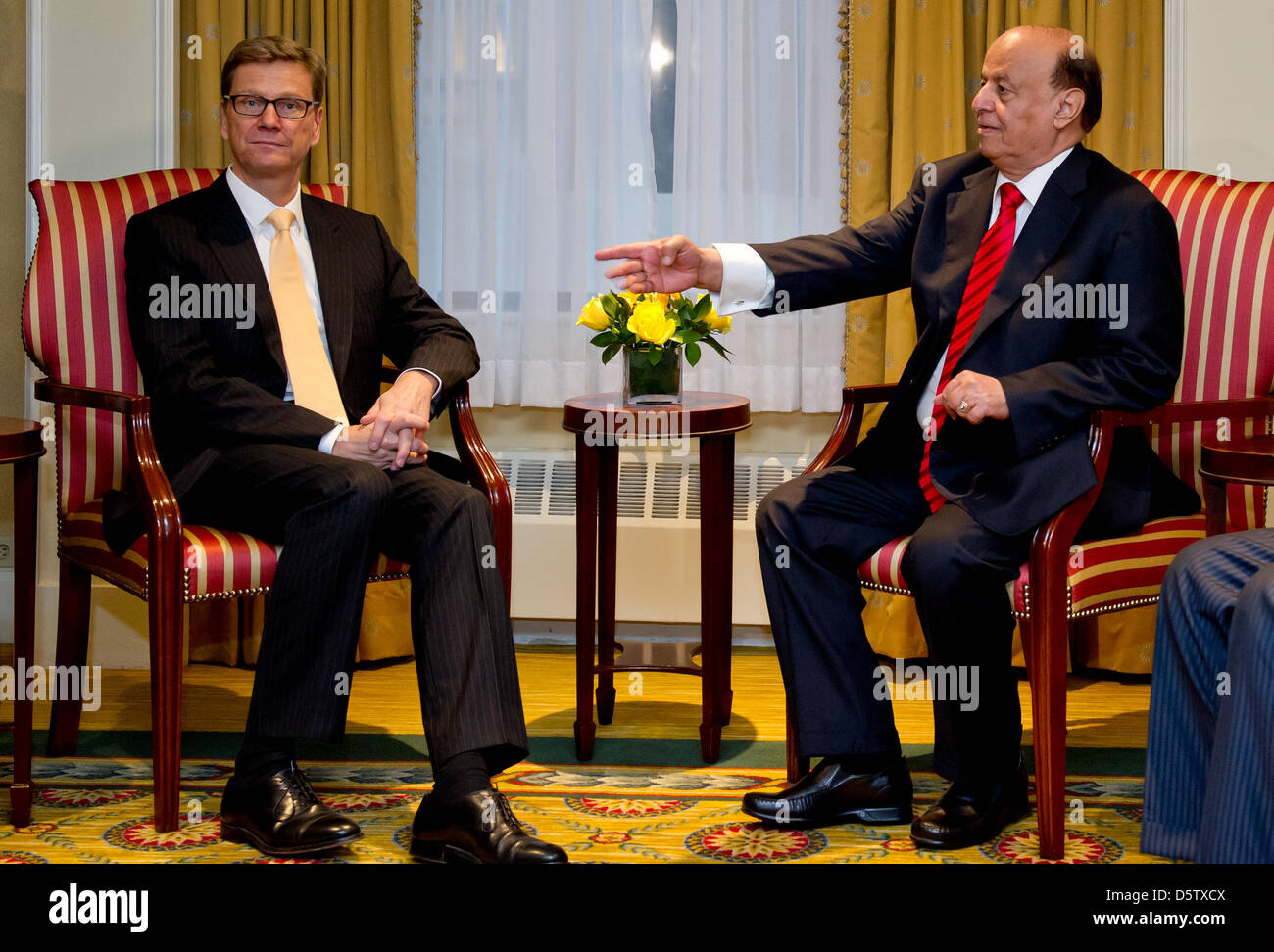 German Foreign Minister Guido Westerwelle (FDP, L) meets Yemeni President Abd Rabbuh Mansur Al-Hadi in New York, USA, 27 September 2012. Westerwelle is in New York from 21 till 28 September 2012 for the 67th United Nations General Assembly. Photo: SVEN HOPPE Stock Photo