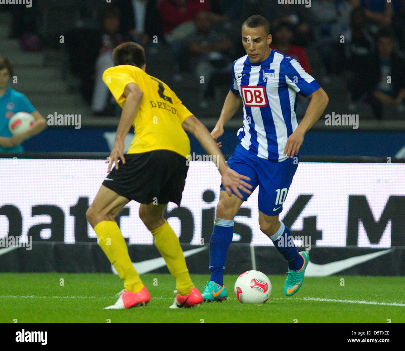 Hertha's Aenis Ben-Hatira and Dresden's vie for the ball during the 2nd Bundesliga soccer match between Hertha BSC and Dynamo Dresden at the Olympic Stadium in Berlin, Germany, 26 September 2012. Hertha won the match 1-0. Photo: Max Nikelski Stock Photo
