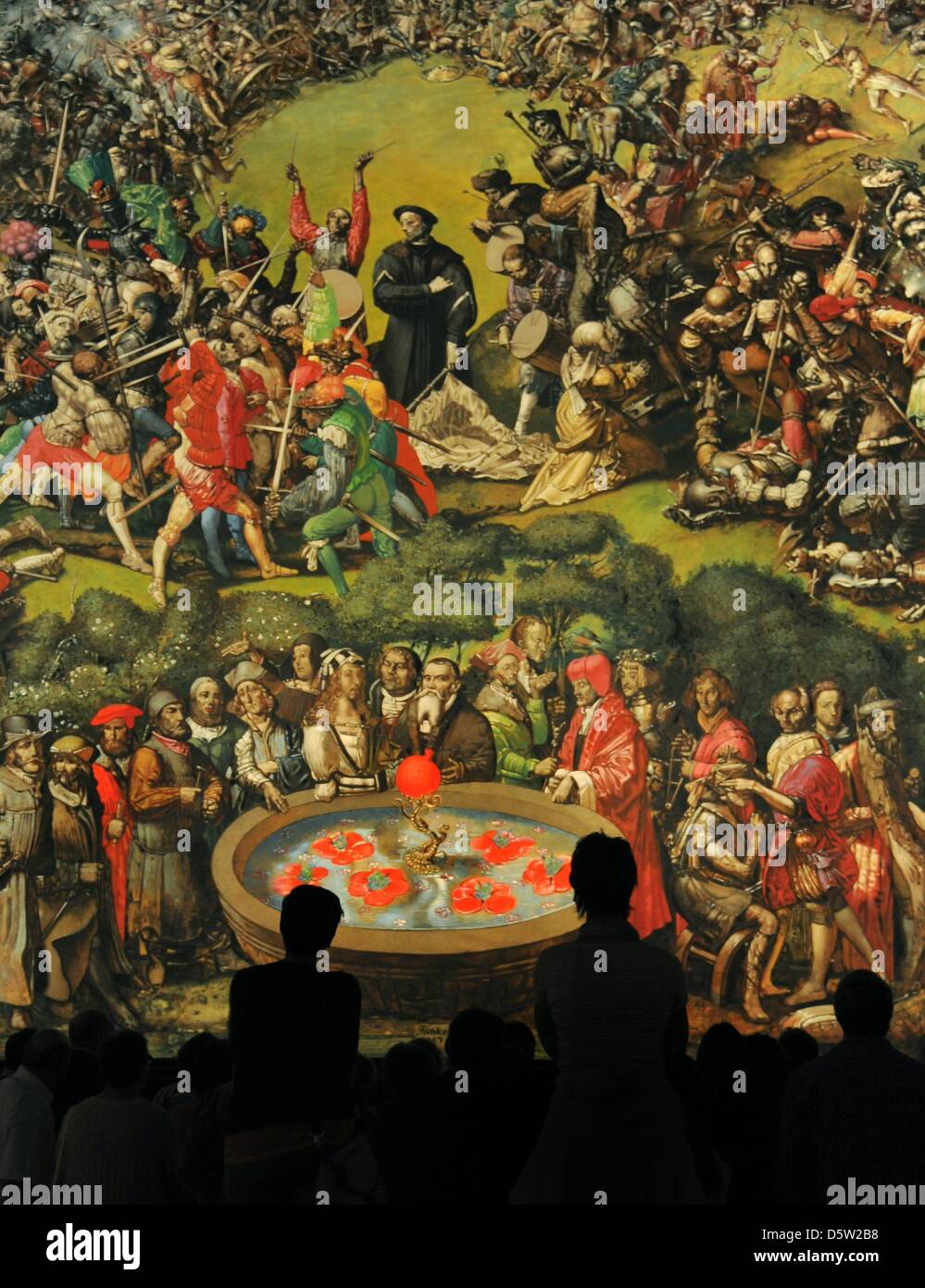 Visitors look at Werner Tuebke's monumental painting 'Early Bourgeois  Revolution in Germany' inside the Panorama Museum Bad Frankenhausen,  Germany, 29 September 2012. 25 years ago, on 16 October 1987, Tuebke signed  the