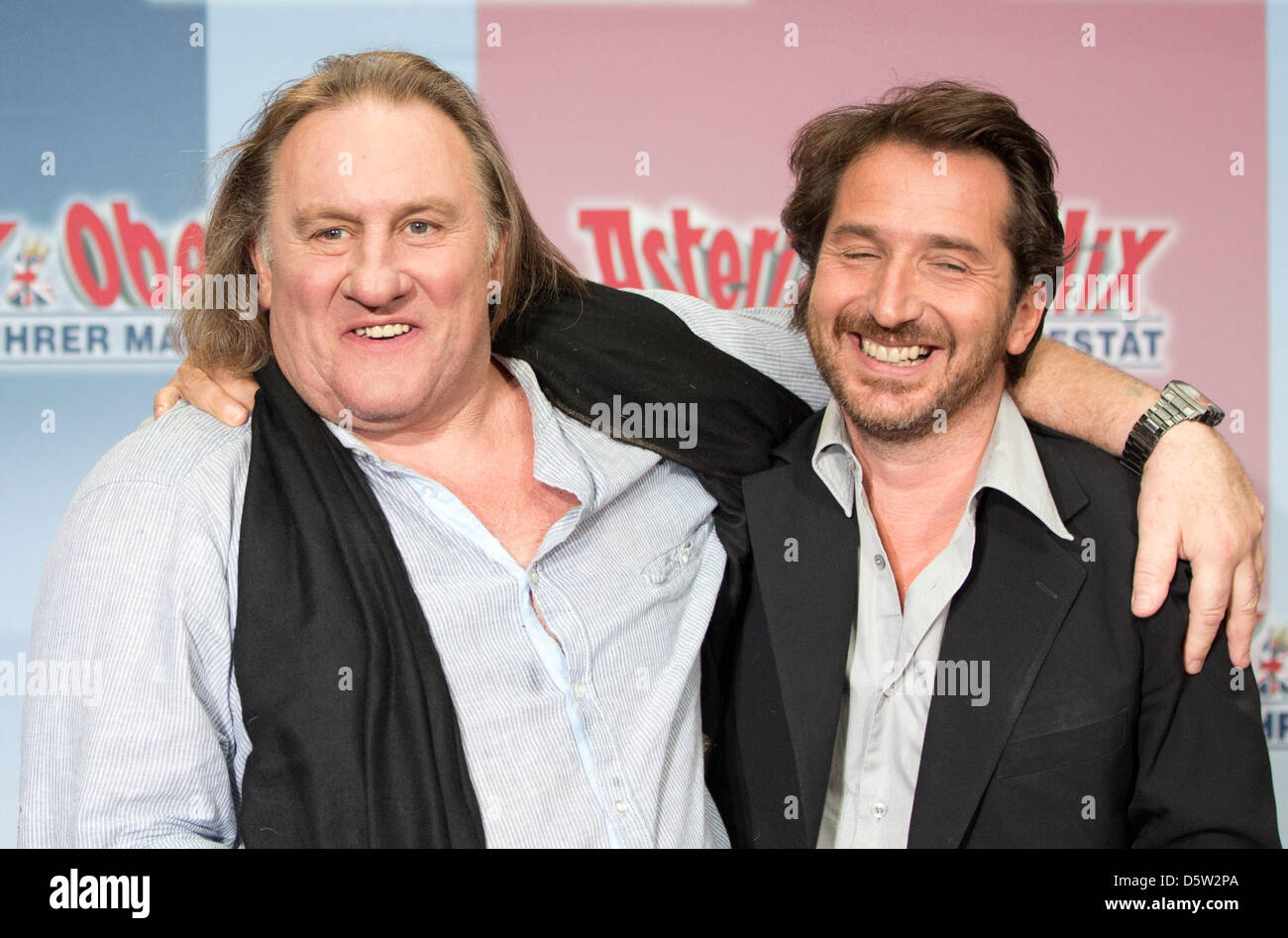 Actors Gerard Depardieu (L) Edouard Baer pose during a photocall for their new movie 'Asterix & Obelix - On Her Majesty's Service'  in Berlin, Germany, 01 October 2012. The mocie will come to German cinemas on 18 October 2012. Photo: JOERG CARSTENSEN Stock Photo