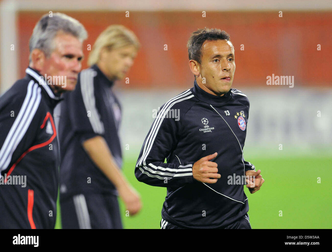 Player of Bundesliga soccer club Bayern Munich, Rafinha (R), takes part in the final training at Dinamo Stadium in Minsk, Belarus, 01 October 2012. Bayern Munich will play FC Bate Borisov in the second group match of the Champions League season 2012-2013 in the capital of Belarus on 02 October 2012. Photo: ANDREAS GEBERT Stock Photo