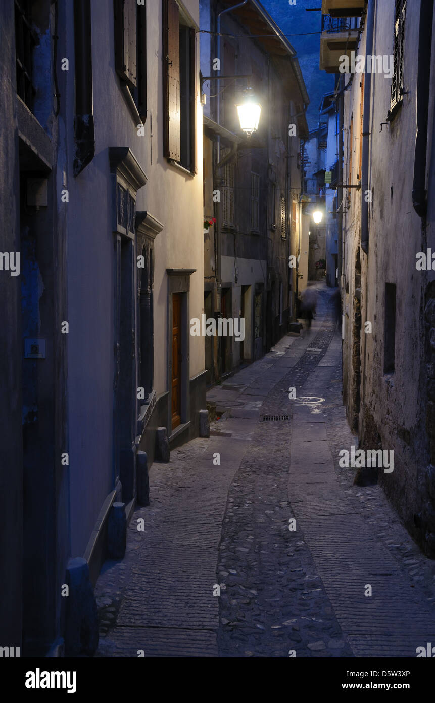 Dark Dingy Alley or Narrow Street in Tende at Night Roya Valley Alpes-Maritimes France Stock Photo