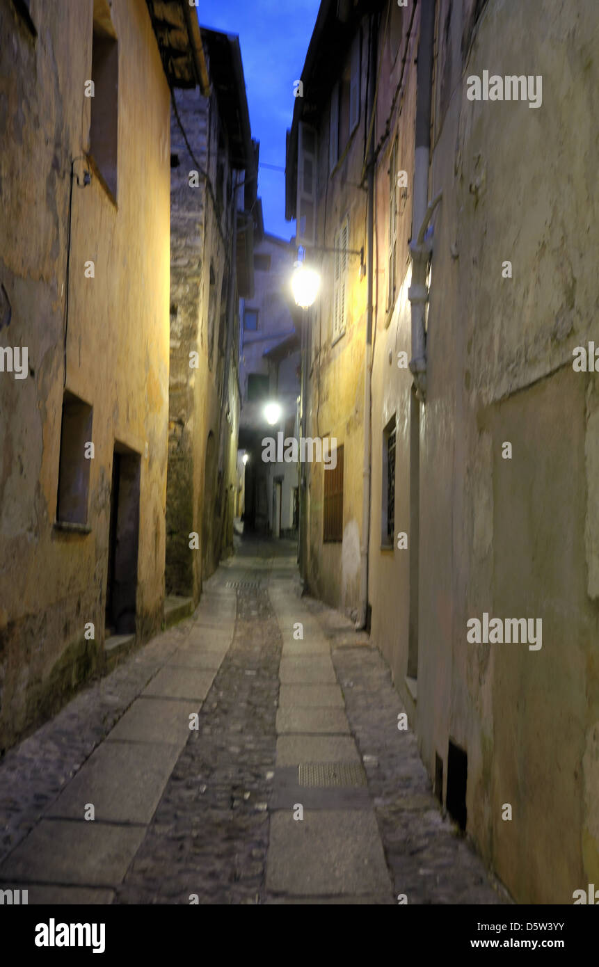 Dark Dingy Alley or Narrow Street in Tende at Night Roya Valley Alpes-Maritimes France Stock Photo