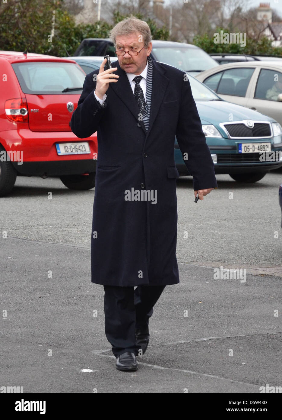 Michael Colgan outside The Church of Miraculous Medal for the Funeral Mass of actor David Kelly Dublin, Ireland - 16.02.12. Stock Photo