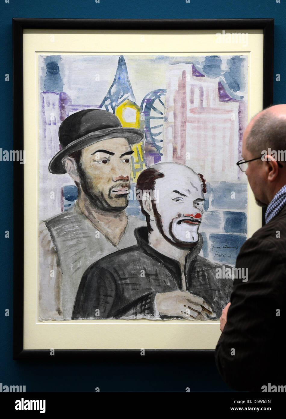 A man views the watercolour 'Two Clowns' at the new exhibition 'Erich Heckel. Power of the Line' at the art museum Moritzburg in Halle/Saale, Germany, 04 October 2012. The exhibition will open on 06 October 2012 and displays 65 drawings and watercolours of the 'Bridge'-artist which give an overview of his artistic development. Photo: Hendrik Schmidt Stock Photo