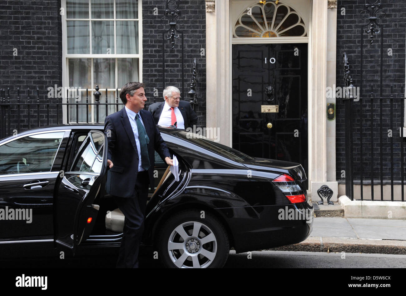 Premier of Lower Saxony David McAllister (CDU, L) and the German ambassador in London, Georg Boomgaarden, arrive with their car in front of 10 Downingstreet, the official residence of the British Prime Minister, in London, Great Britain, 04 October 2012. McAllister is in London to attract loan items for the state exhibition 2014 on the occasion of the 300 anniversary of the Hanover Stock Photo