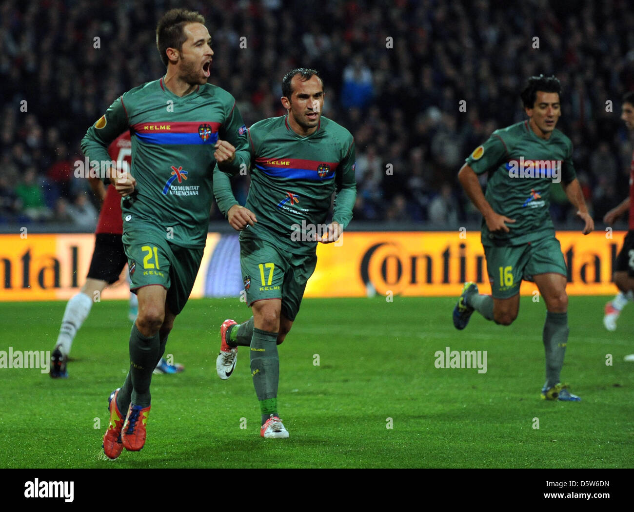 Levante's Michel (L) celebrates with Pedro Rios (R) and Theofanis Gekas after scoring the 1-0 during their Europa League Group L soccer match between Hannover 96 and Spanish Levante UD at Hannover Arena in Hanover, Germany, 04 October 2012. Photo: Peter Steffen/dpa  +++(c) dpa - Bildfunk+++ Stock Photo