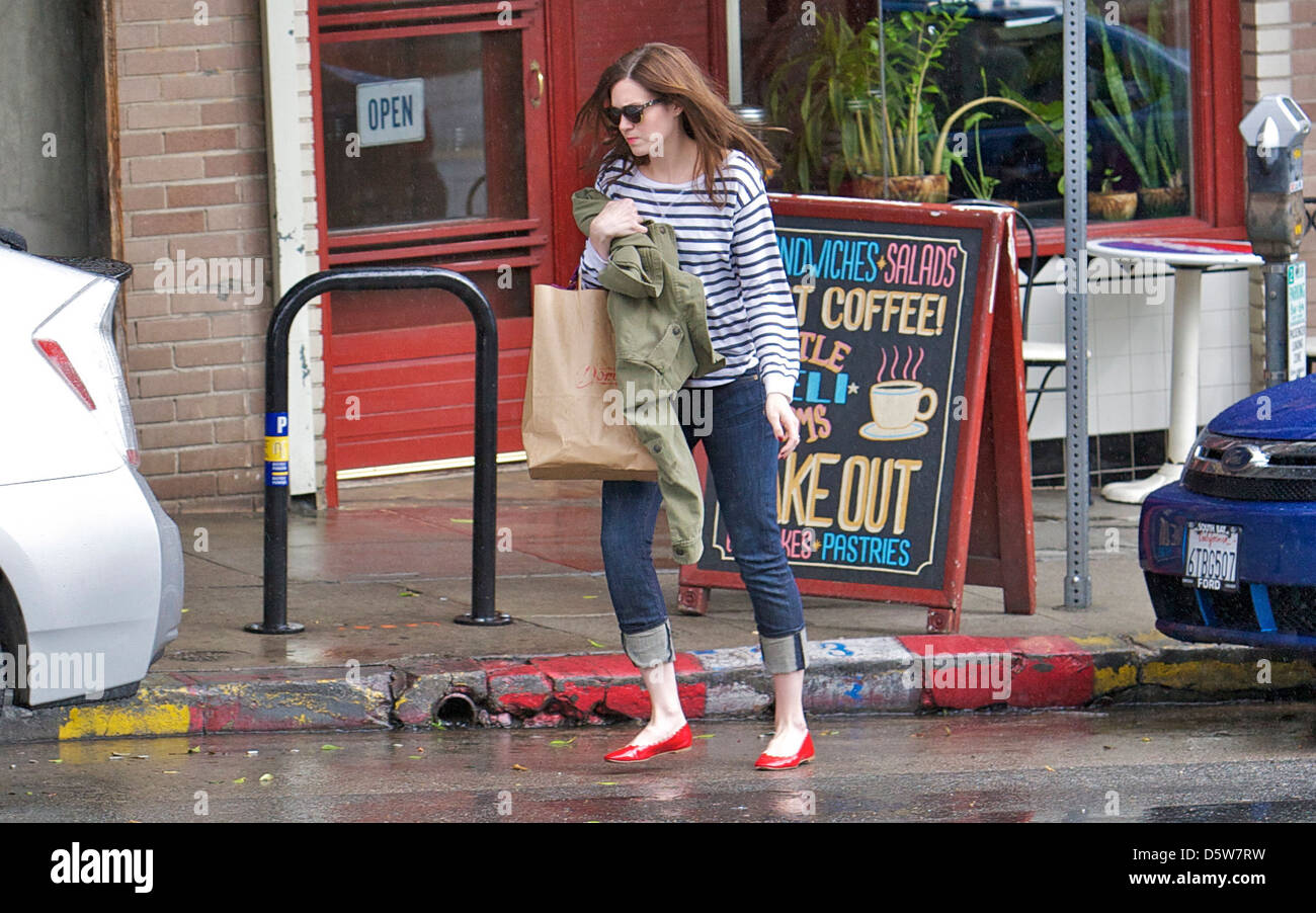 Mandy Moore is seen leaving Little Dom's restaurant in the rain after