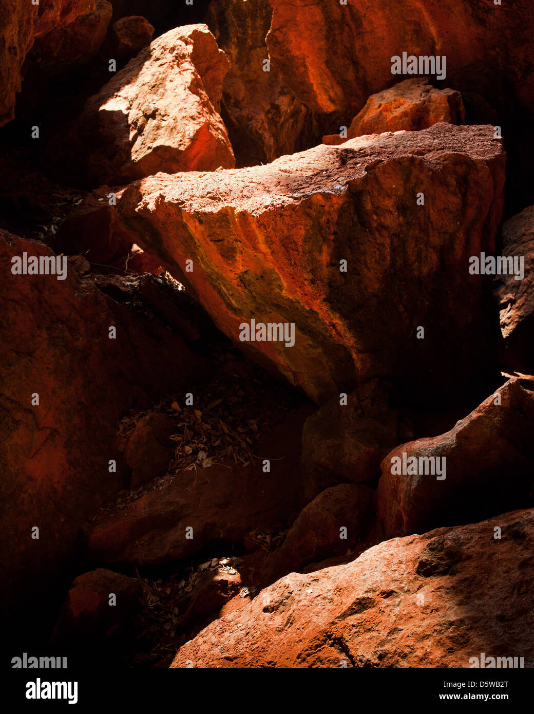 Colorful texture of rocks inside mountain cave darkness Stock Photo