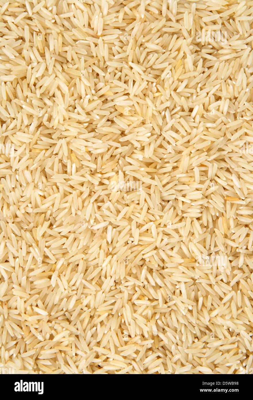 Uncooked basmati rice background. Abstract food textures Stock Photo ...