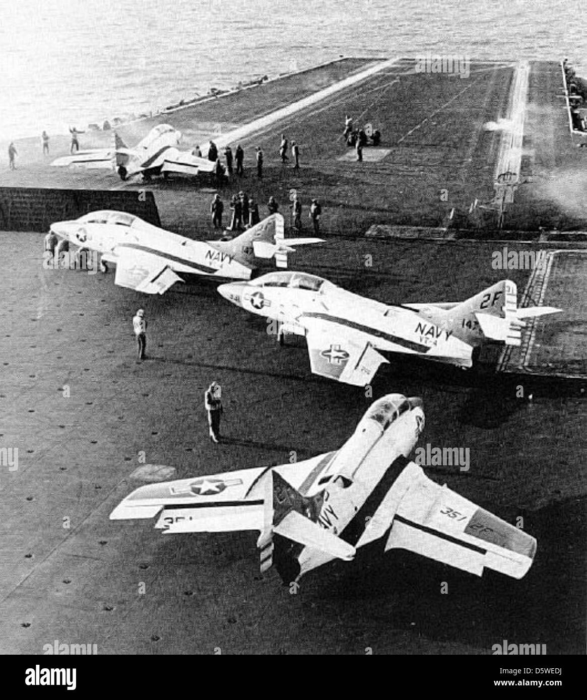 The last operational U.S. Navy Grumman TF-9J 'Cougar' trainers of training squadron VT-4 making their final launches from the USS JFK (CVA-67), Feb. 1974. Stock Photo