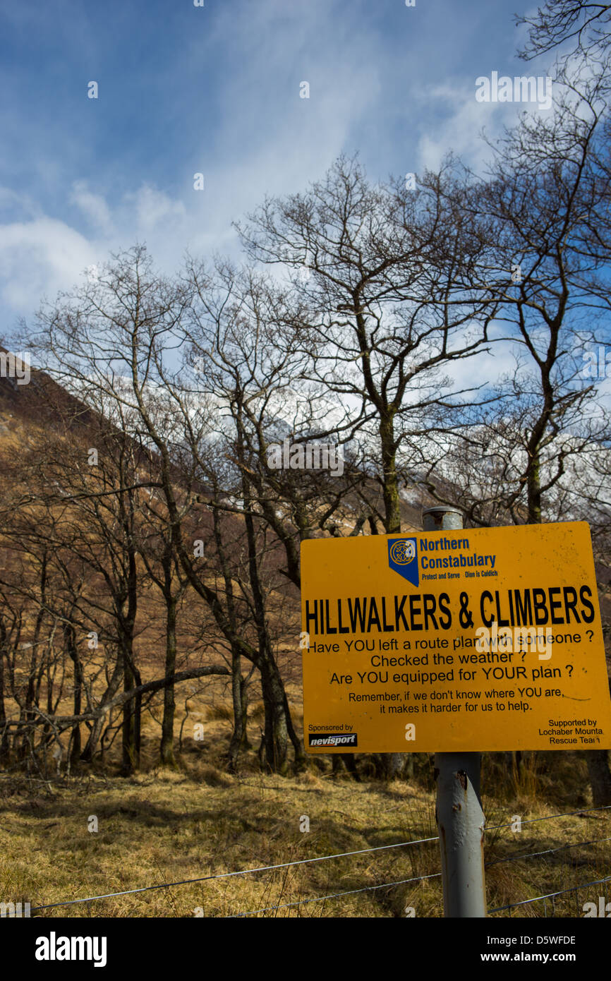 A warning sign advising hillwalkers and climbers to leave details of their plan with someone else Stock Photo