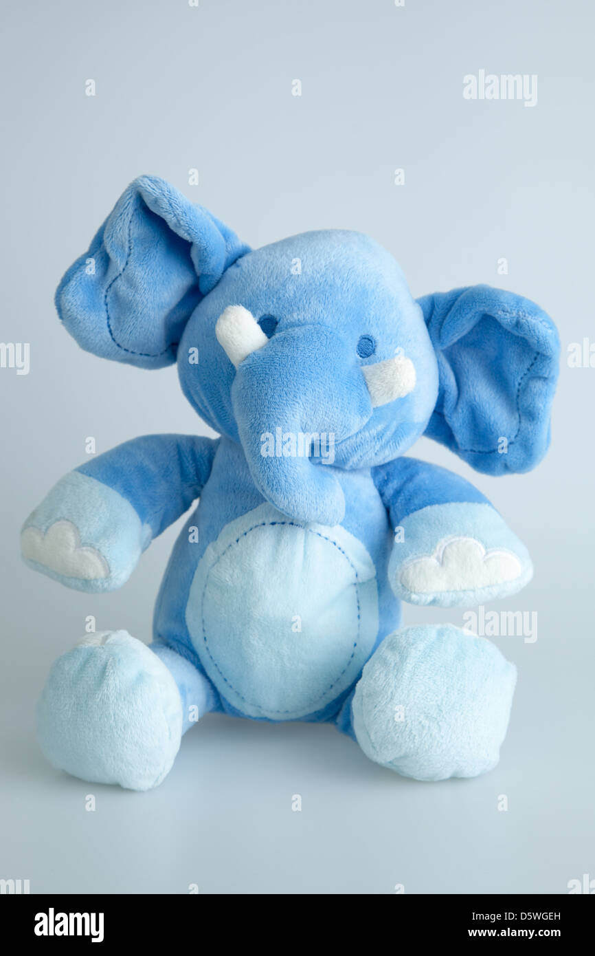 Toddler cuddling stuffed animal hires stock photography and images Alamy