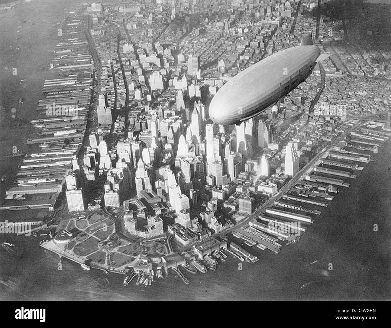 USS Akron over Manhattan, circa 1931-1933. Stock Photo