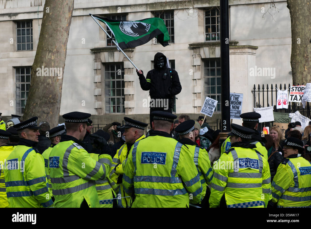 Protesters gather at Downing Street, London on 30th March 2013, to campaign against the newly introduced Bedroom Tax. Stock Photo