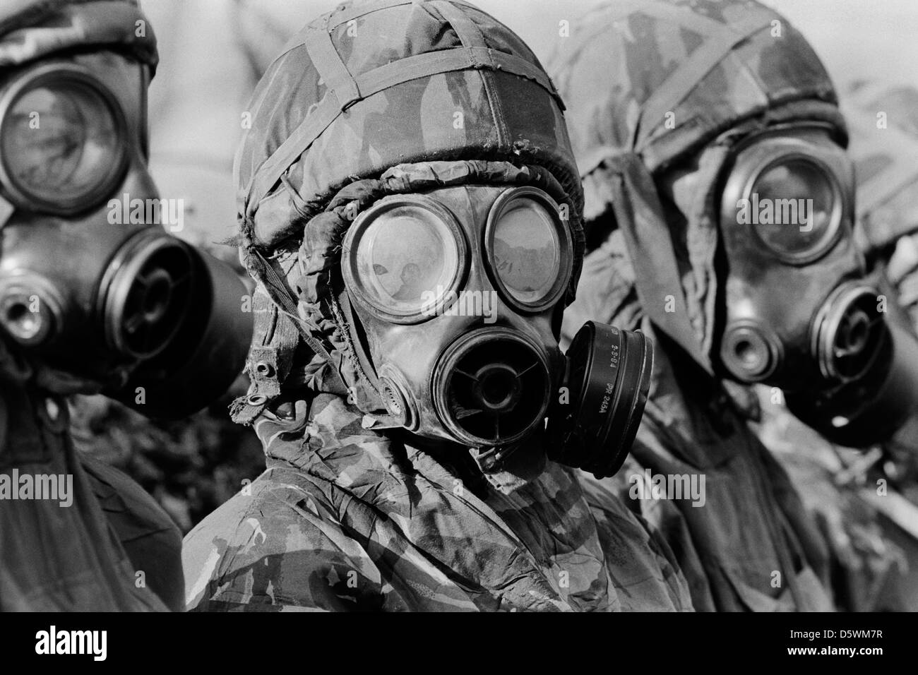 British soldiers wearing nbc protective gear undergo training for a gas attack during an exercise. Stock Photo